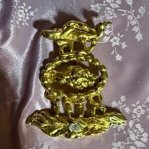 Vintage designer Gold Brooch with Gemstone Accent